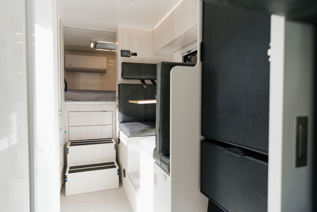 2026 AEONrv Truck Camper - side view wih storage drawers