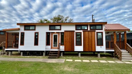 Austin Tiny House Packs Fireplace and Island Kitchen Between Two Porches Austin Tiny House exterior