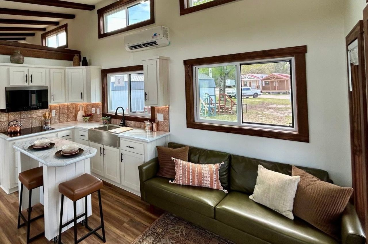Living room with sofa in Austin tiny house on wheels