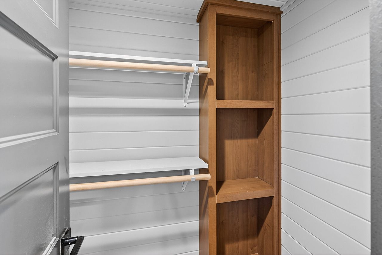 Closet of Bungalow tiny house