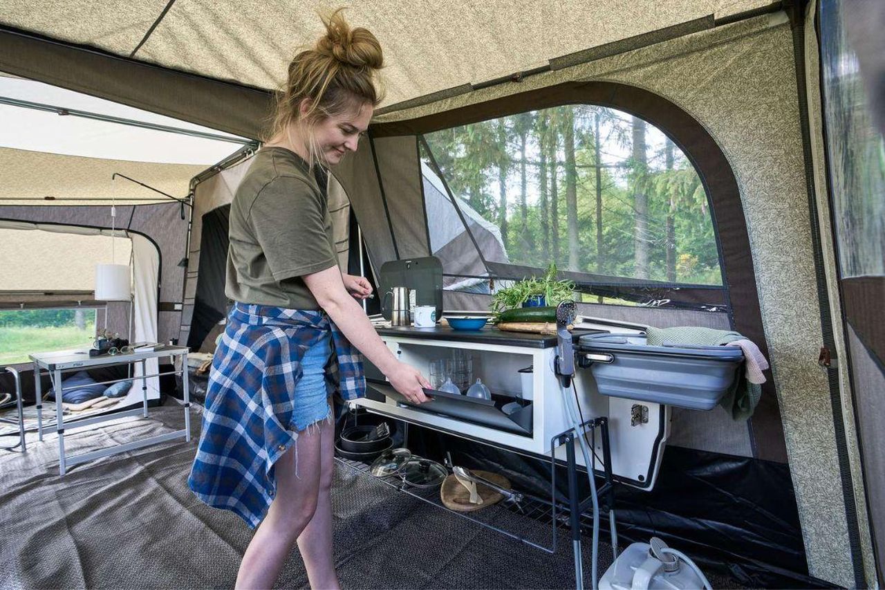 Kitchen and interior space of Earth tent trailer