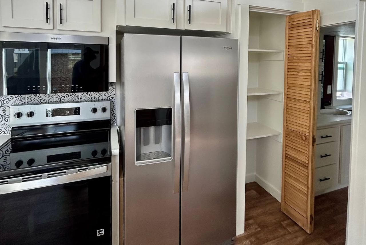 Storage and appliances inside Cardinal tiny house