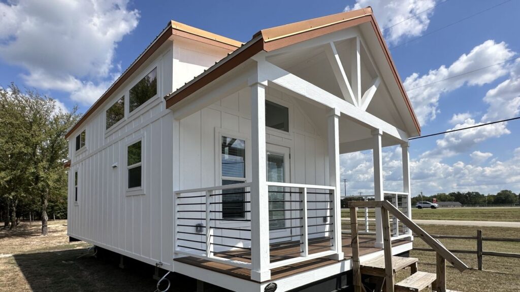Cardinal Tiny House Fits Two Bedrooms and Porch in 399 sq. ft. Footprint Cardinal tiny house Park Model on wheels in Texas USA