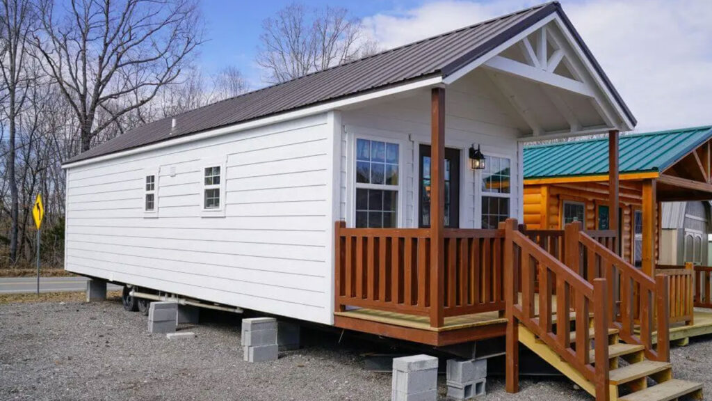 Country Cabin Tiny House is Extra-Wide Dwelling With Open Porch, Two Bedrooms Exterior of Country Cabin tiny house