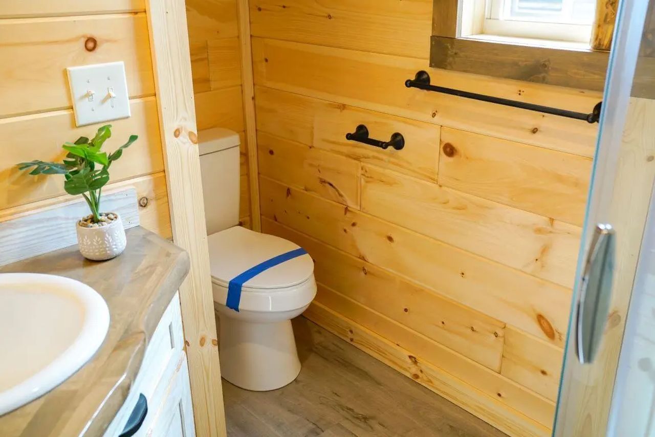 Toilet of Country Cabin tiny house exterior