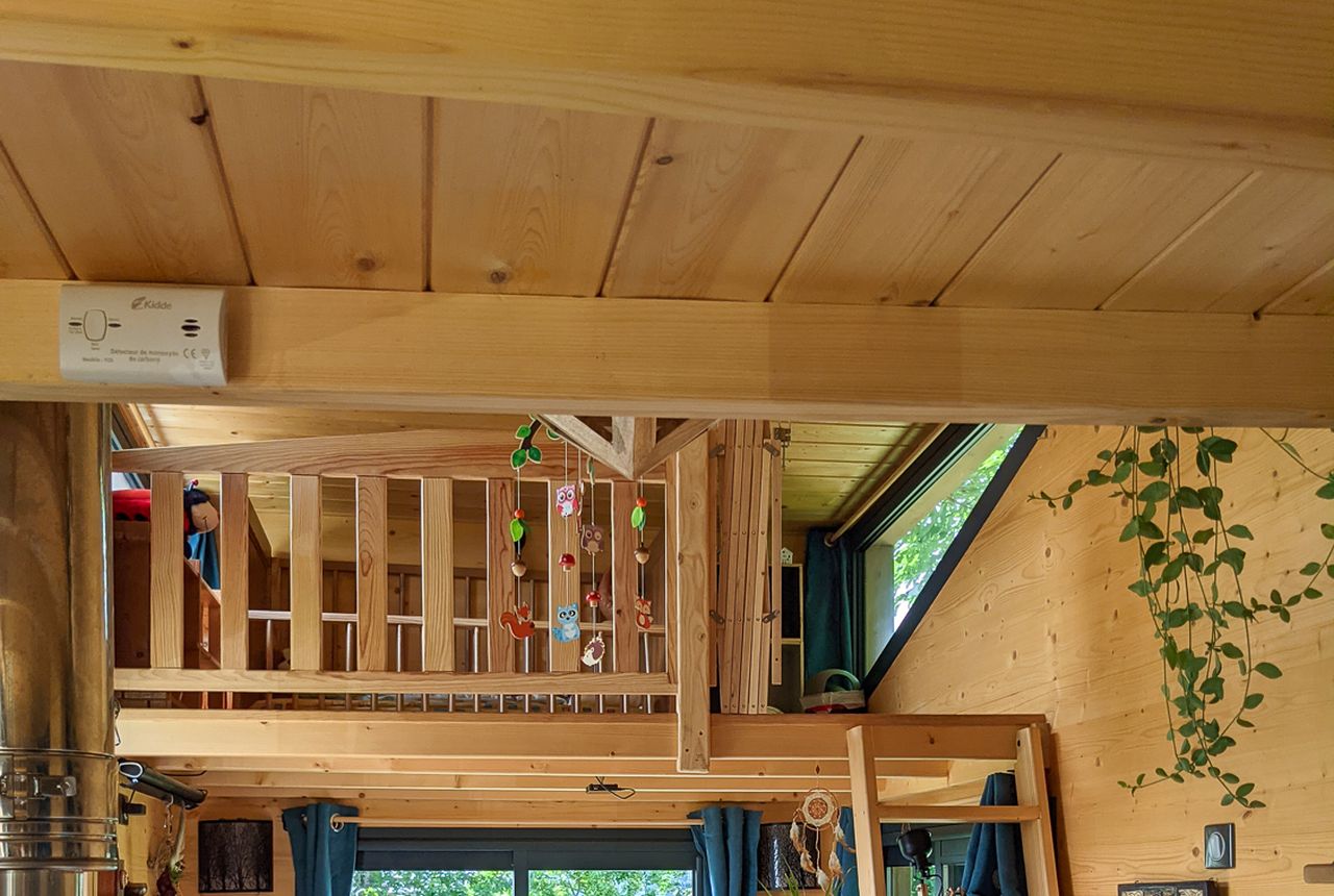 Loft of Virginie and Mathieu Curved-Roof Tiny House