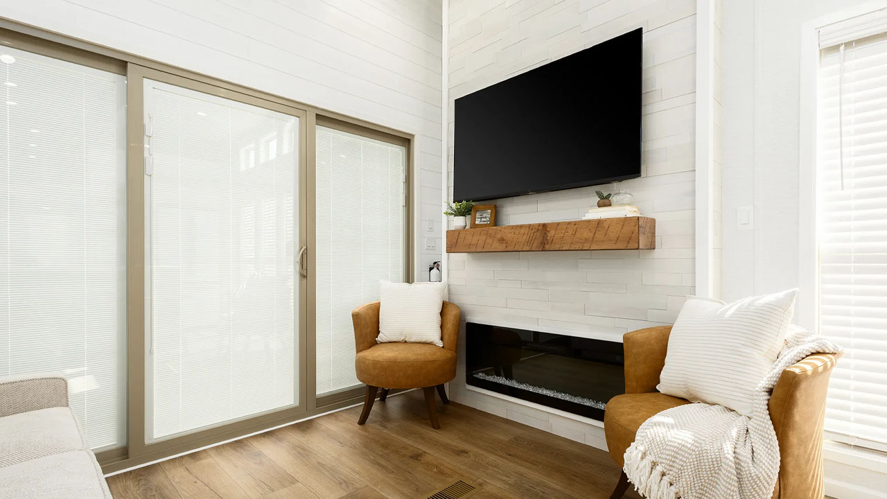 Eldorado 9081P Tiny House indoor entertainment and fireplace