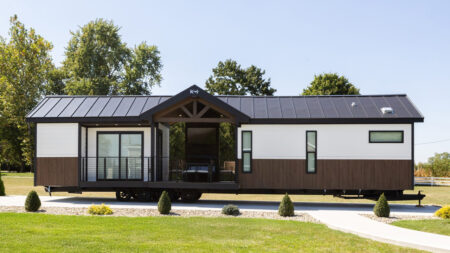 Single-Level Eldorado Tiny House Puts Porch in the Middle With TV and Fireplace, Splits Layout in Two Eldorado 9109 Tiny House
