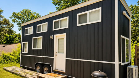 Farmhouse-Style Lake Lanier Tiny House Offers 300 sq. ft. of Flexible Layout Lake Lanier tiny house on wheels with farmhouse-style aesthetics