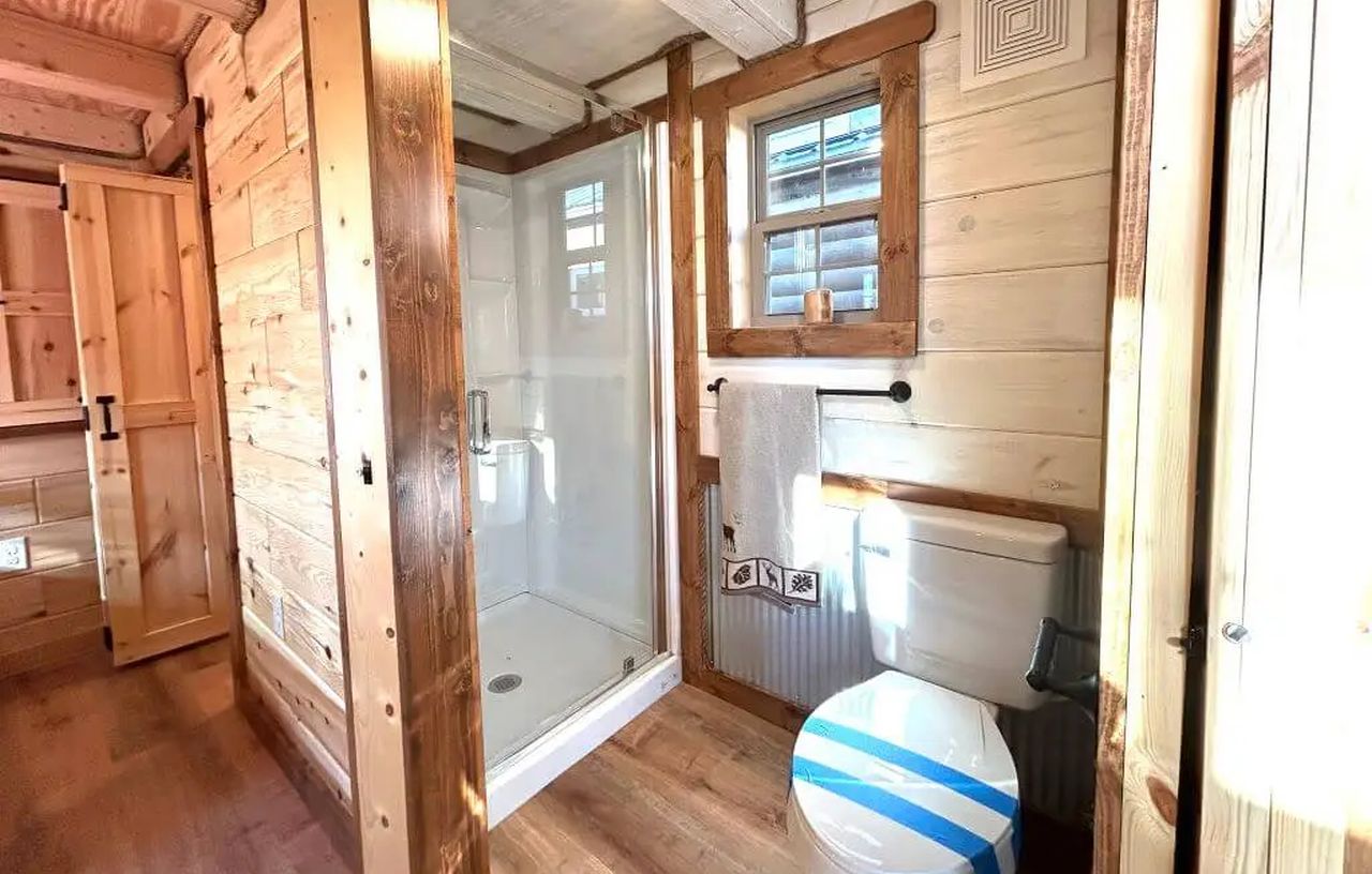 Toilet and Bathroom of Kitchen view of Lake Tahoe Tiny House