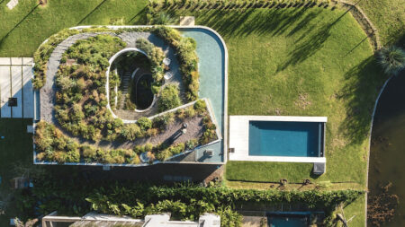 Spiral-Shaped Living GP House Features Open-Air Courtyard and Garden Rooftop Living Sculptural House Conceals Open-air Courtyard Beneath Spiral Rooftop Garden