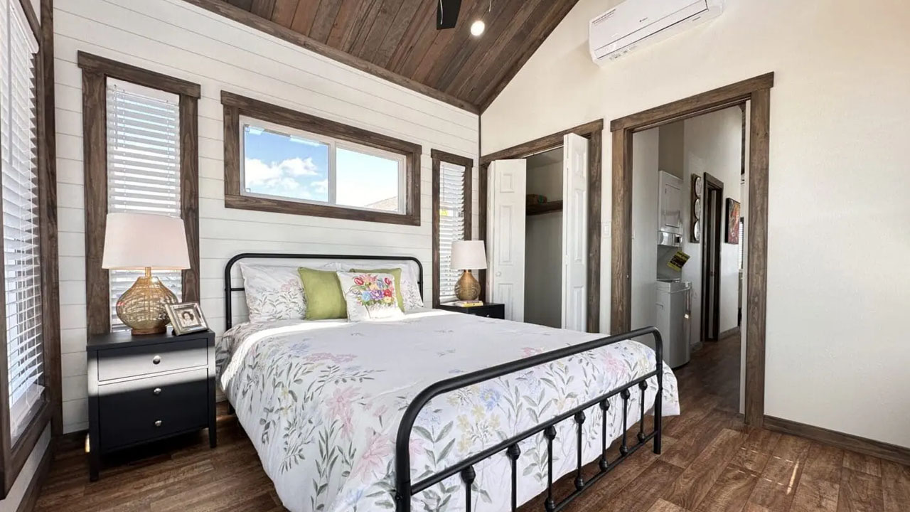 Mini Willow Tiny House - bedroom with walk-in closet