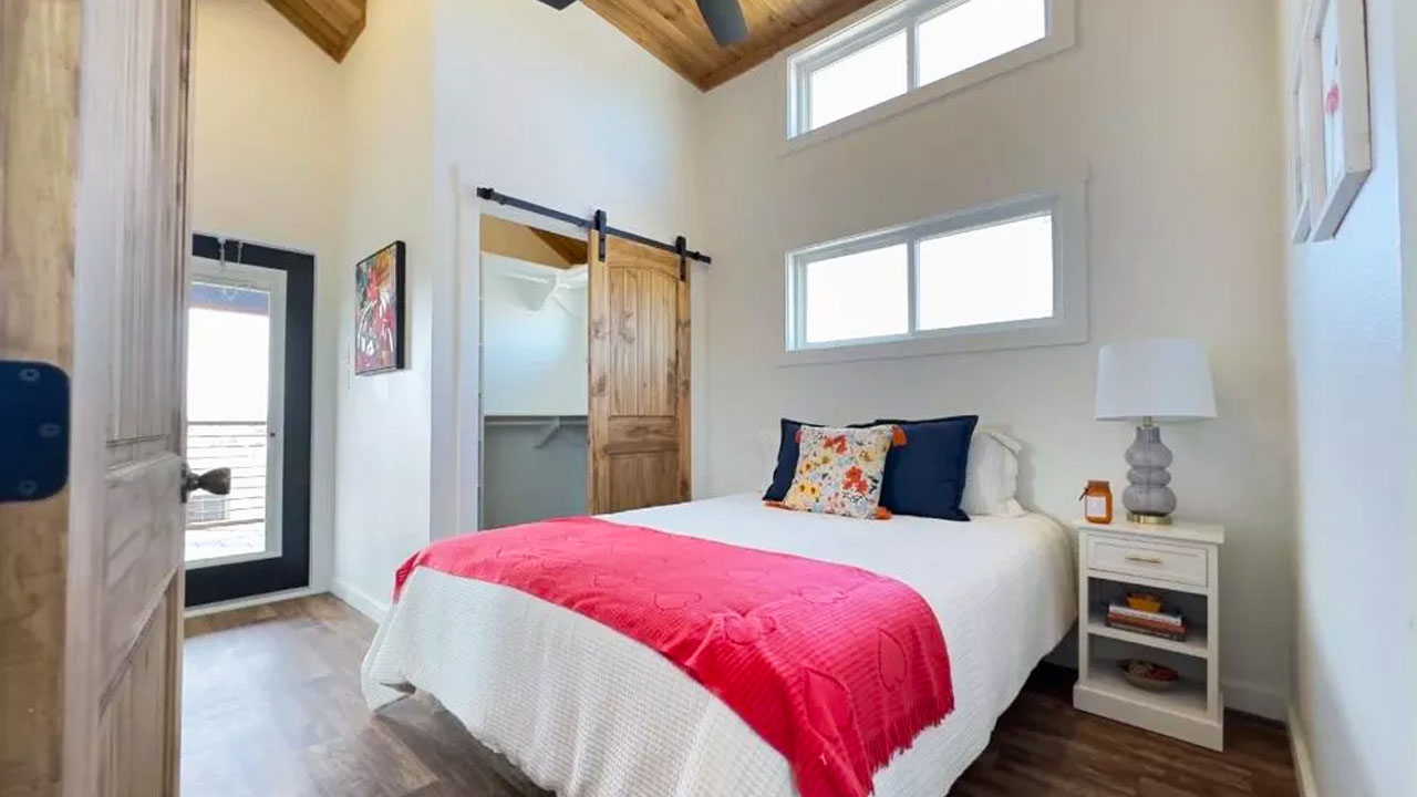 Mockingbird Tiny house bedroom with screened private porch