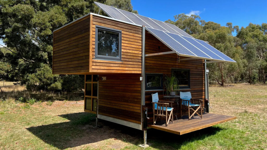 Off-Grid Sustainable Tiny House has Quaint Angular Form Factor, Deck Bathroom Enclosed by Japanese Shoji Screen Off-Grid Sustainable Tiny House Packs Large Angular Solar Panels and a Deck Bathroom Enclosed With Japanese Shoji Screen