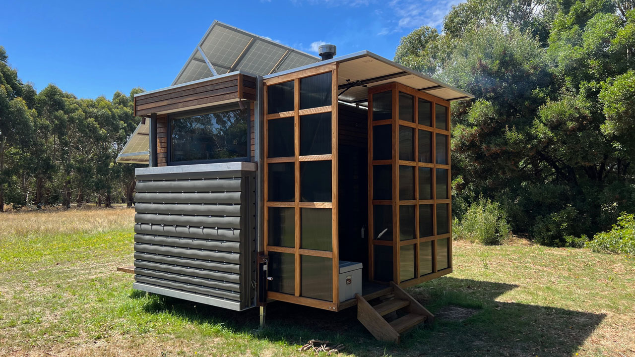 Off-grid sustainable tiny house-corrugated metal siding