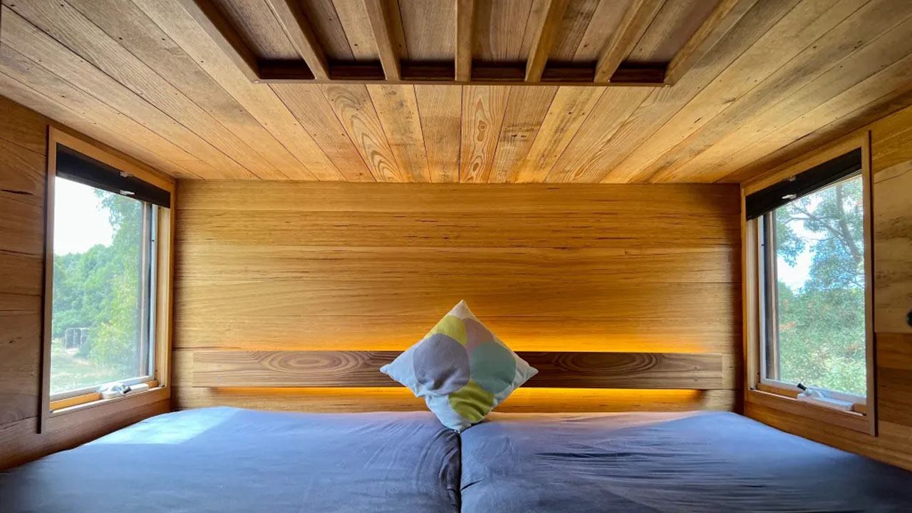 Off-grid sustainable tiny house-loft bedroom