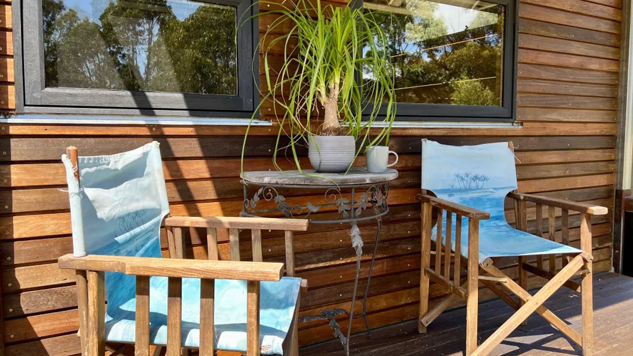 Off-grid sustainable tiny house-wooden deck