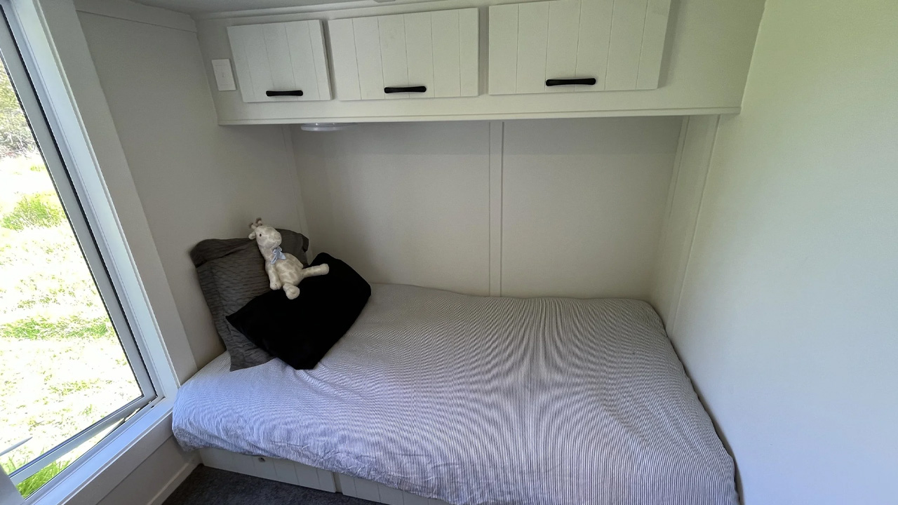 Old Man Pine Tiny House_Ground-Floor Kid's Bedroom With Storage-Integrated Bed