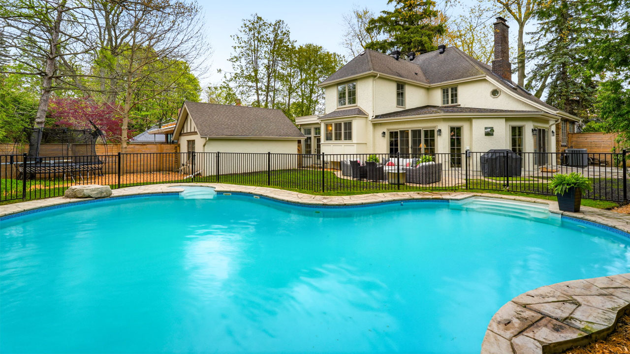 Ontario Tudor House-backyard pool and stone patio