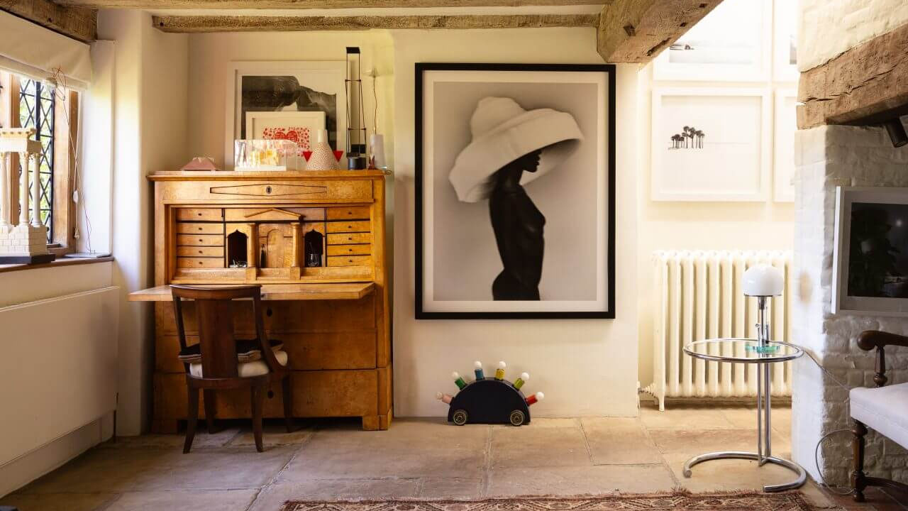 Princess Margaret’s West Sussex Estate-contrasting wooden furniture against neutral walls