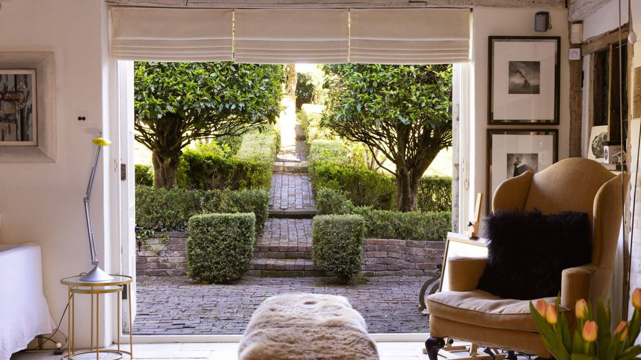 Princess Margaret’s West Sussex Estate-interior open into lush garden