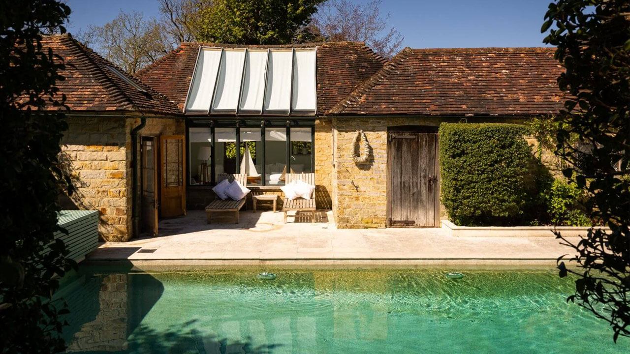 Princess Margaret’s West Sussex Estate-stone cottage with outdoor pool