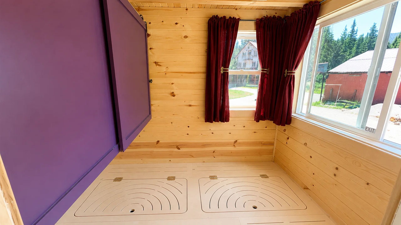 Scandinavian-style tiny house-light-filled groundfloor bedroom