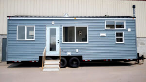 Two-Bedroom Smidge Tiny House Packs an Office and Murphy Bed in 368 Square Feet Layout Exterior of Smidge tiny house on wheels