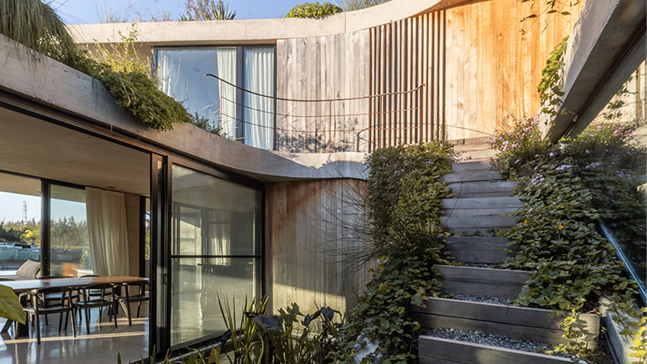The GP House-The contrasting concrete and glazed facade