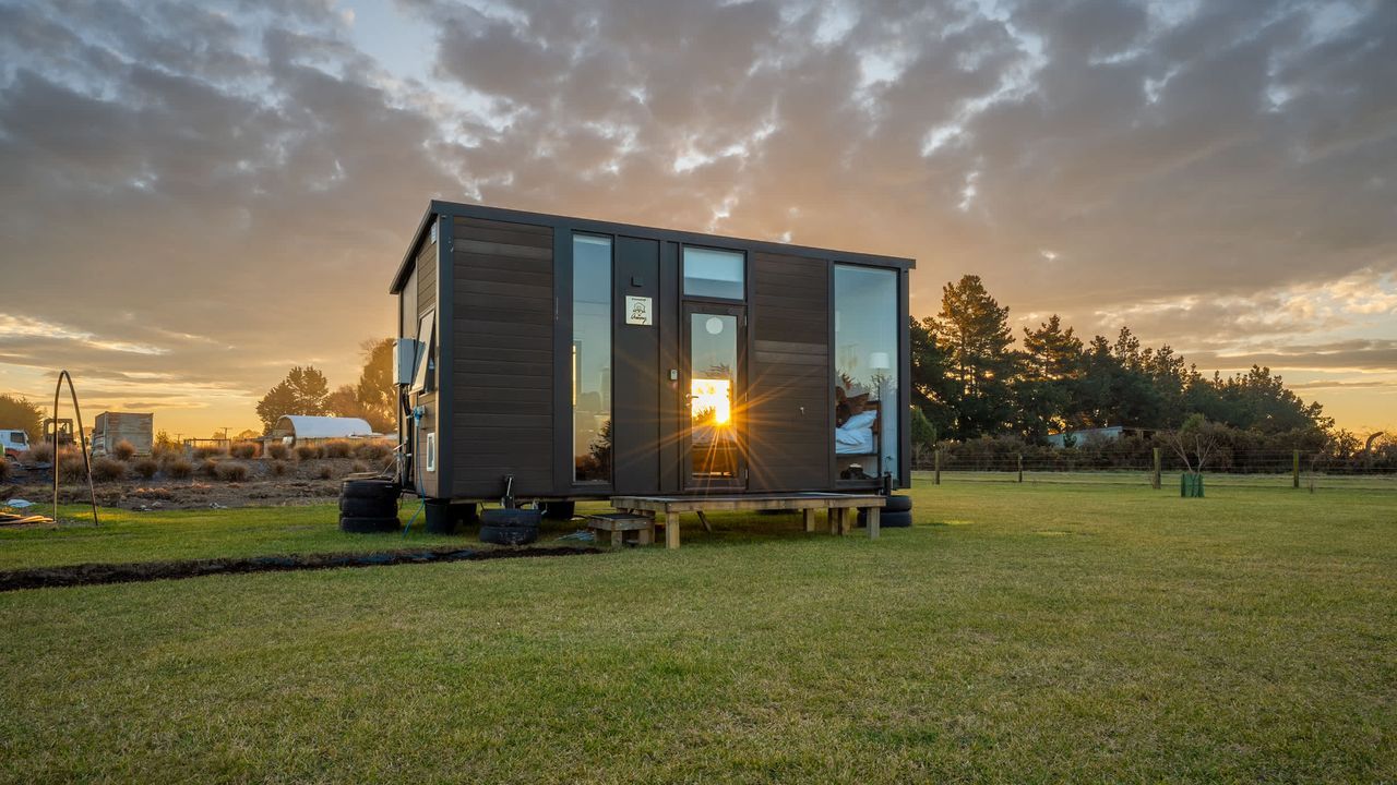 Tiny House with Clever Window Arrangement - front view