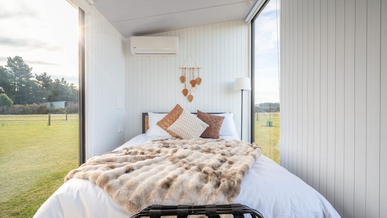 Tiny House with Clever Window Arrangement - sleeping area