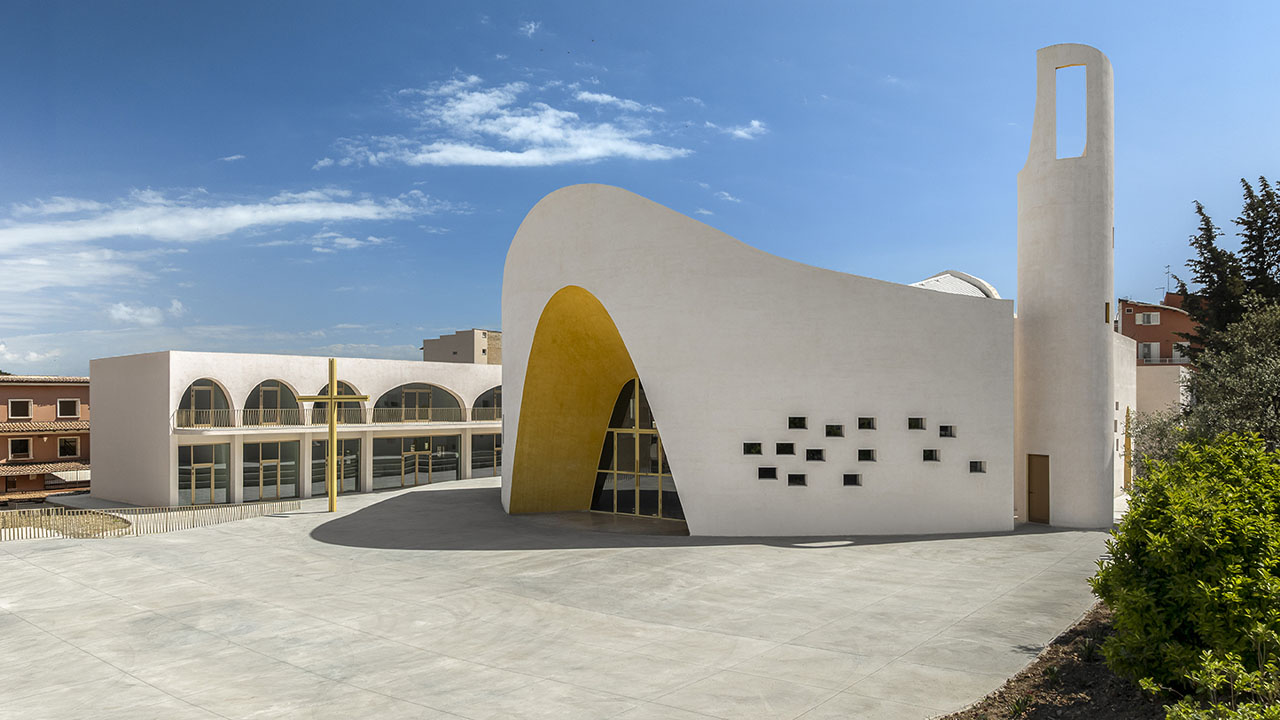 The Parish Complex-sculptural facade with golden accents