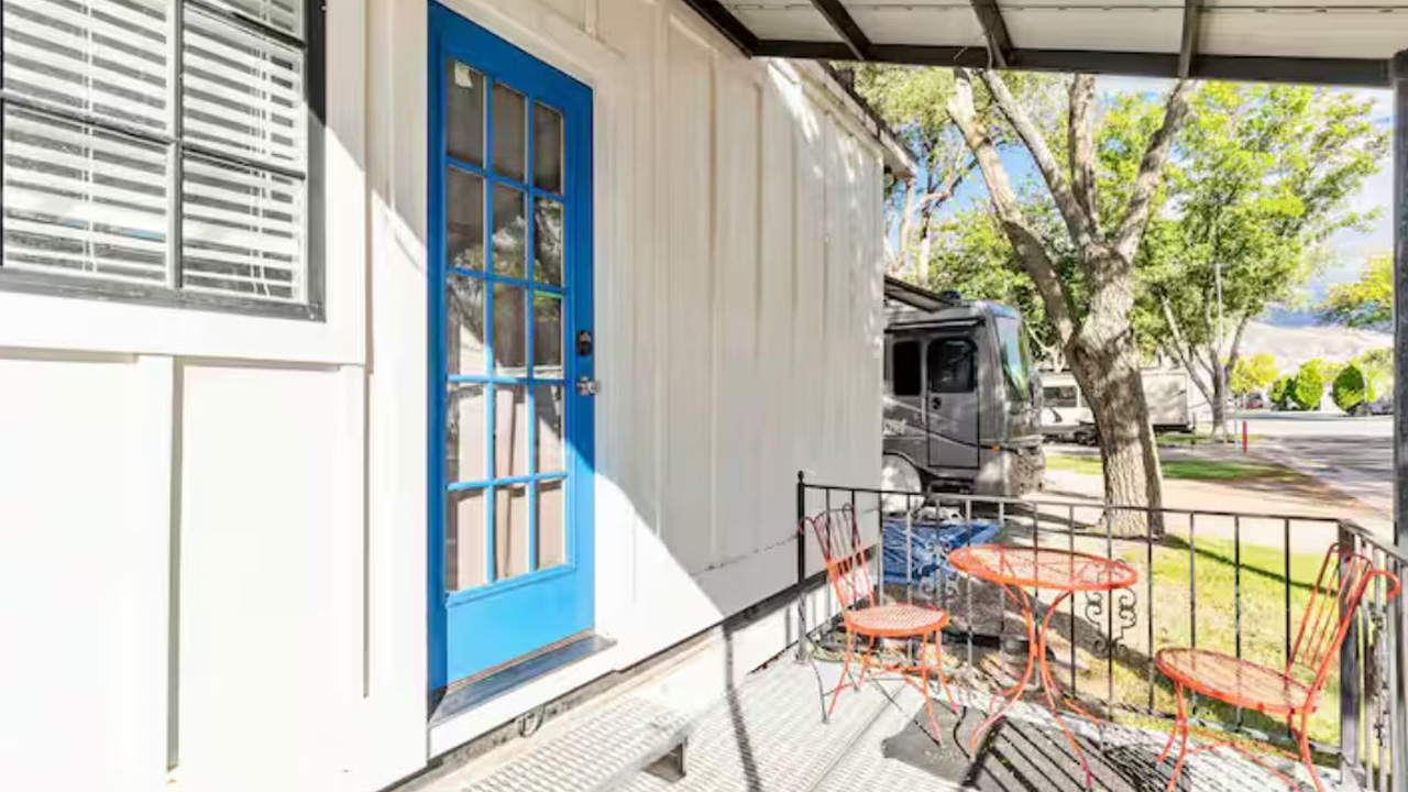Charming Tiny House_Exterior With Covered Porch and Seating 