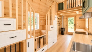 30 ft. Scandinavian Tiny House has Three Bedrooms, Pet Kennel in Dual Storage Staircase This Scandinavian-Style Tiny House Integrates a pet Kennel and a Safety Gate in Dual Staircase with Built-in Storage