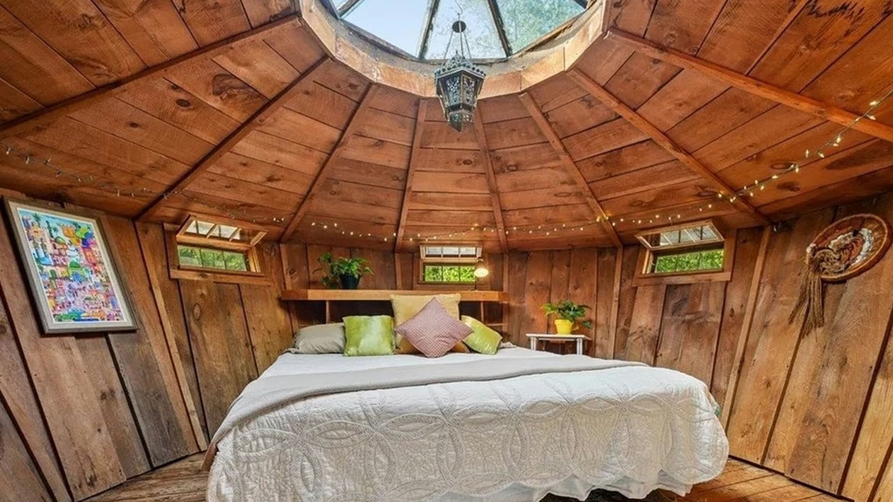 UFO-shaped dreamy rustic cabin-cozy storybook-like loft bedroom