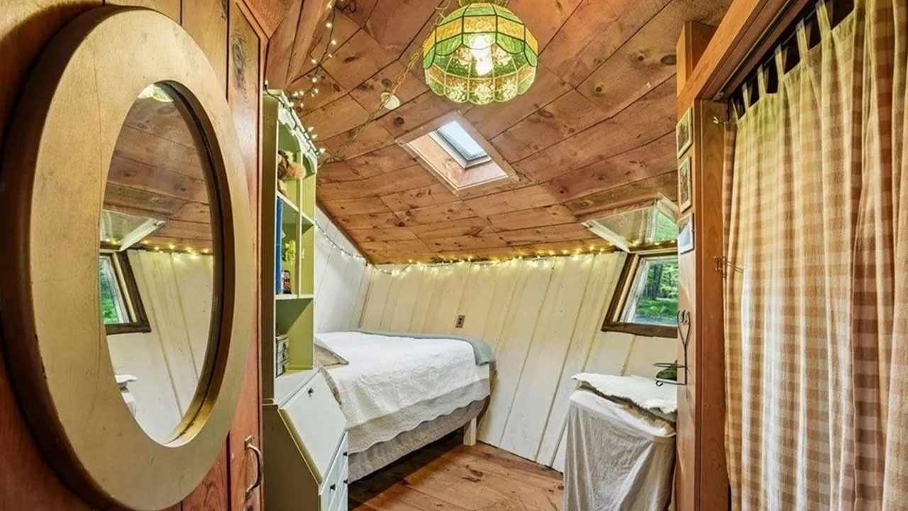 UFO-shaped dreamy rustic cabin-secondary bedroom