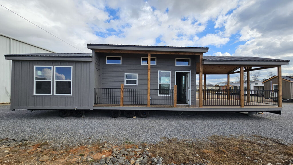 Extra-Wide Veranda Tiny House is Mansion on Wheels With 200 sq. ft. Covered Porch, Walk-In Closet Veranda Tiny House in Greenville Alabama