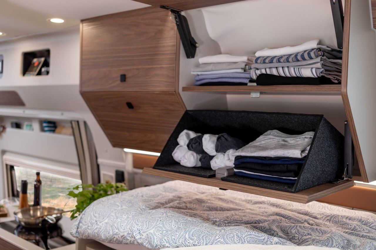 Westfalia Columbus Liner Luxury -Camper Van Features Rooftop Terrace Accessed from Bedroom - storage areas