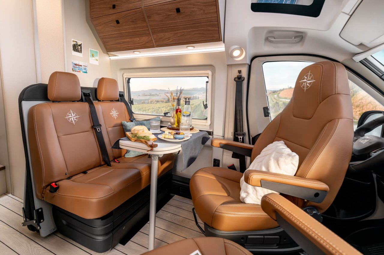 Westfalia Columbus Liner Luxury Camper Van Features Rooftop Terrace Accessed from Bedroom - front driving section