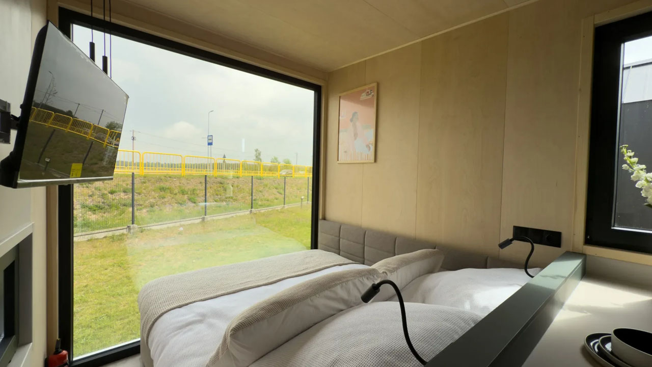 Wood Prestige Tiny House with giant glazed gable wall